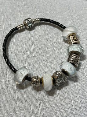 Pandora Black Leather Bracelet with 9 Accent Charms (7 Pandora Beads)
7.25”